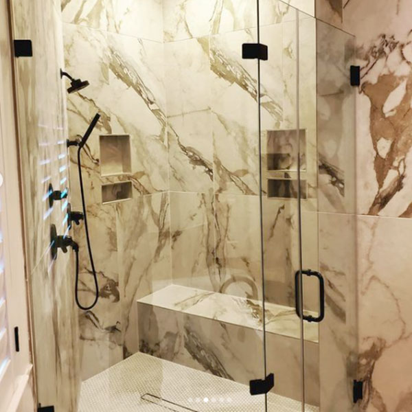 A Footprints Floors Minneapolis Metro marble tile shower installation.