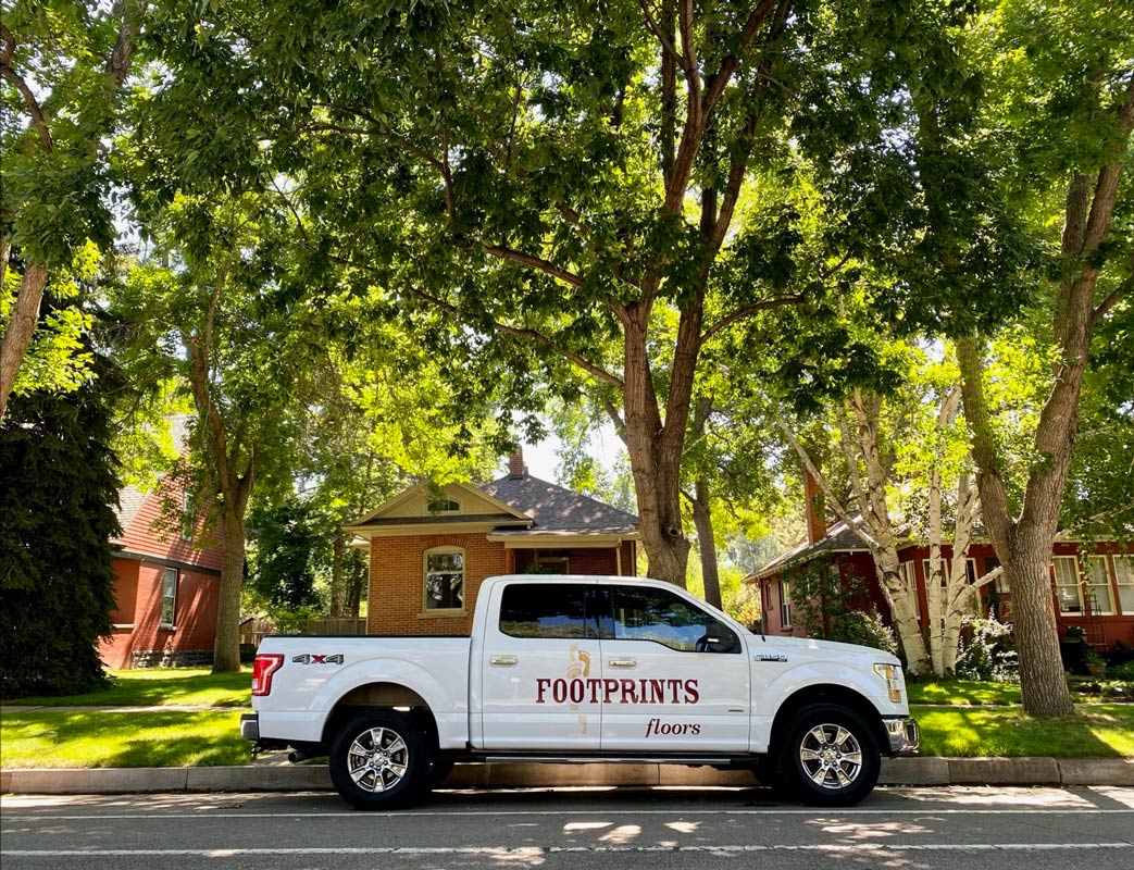 A Footprints Floors service truck - we are the best flooring installation company, dedicated to serving our local community.